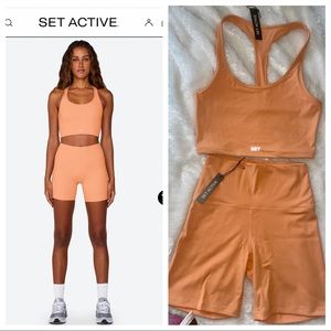 Brand new never worn set active still has the tags (not attached) color is score